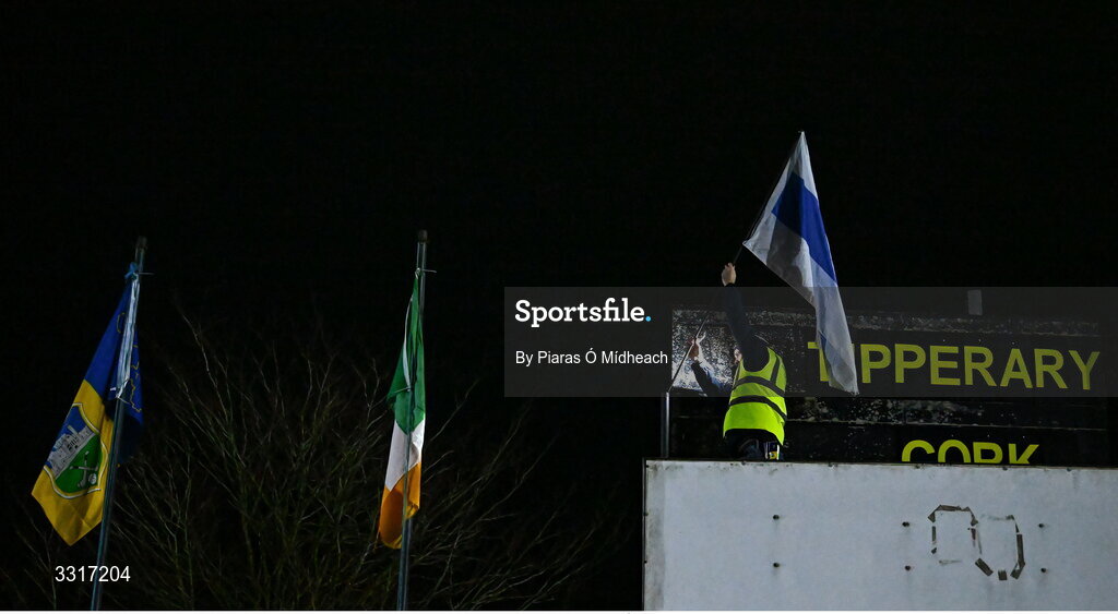 6 January 2026; Groundsman Joe Carmody puts up the Cappawhite GAA club flag before the McGrath Cup match between Tipperary and Cork at Cappawhite GAA Club in Tipperary. Photo by Piaras Ó Mídheach/Sportsfile