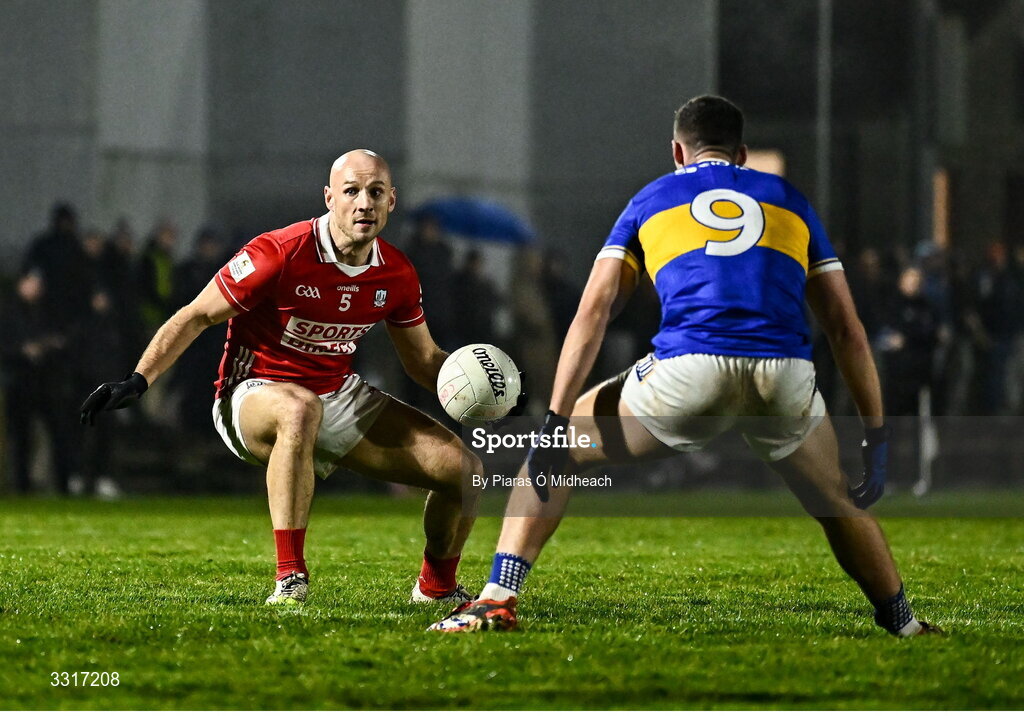 6 January 2026; Brian O'Driscoll of Cork in action against Kieran Costello of Tipperary during the McGrath Cup match between Tipperary and Cork at Cappawhite GAA Club in Tipperary. Photo by Piaras Ó Mídheach/Sportsfile