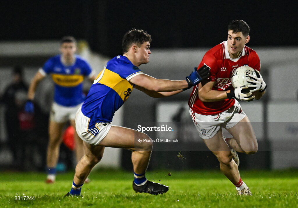 6 January 2026; Rory Maguire of Cork in action against Cathal Deeley of Tipperary during the McGrath Cup match between Tipperary and Cork at Cappawhite GAA Club in Tipperary. Photo by Piaras Ó Mídheach/Sportsfile