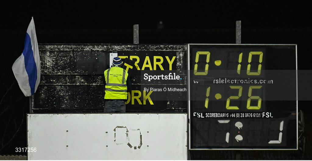 6 January 2026; Groundsman Joe Carmody takes down the team names from the scoreboard after the McGrath Cup match between Tipperary and Cork at Cappawhite GAA Club in Tipperary. Photo by Piaras Ó Mídheach/Sportsfile