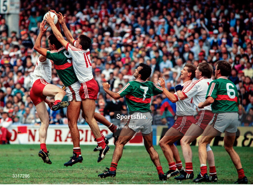 13 August 1989; Ciaran Corr of Tyrone and Liam McHale of Mayo contest a high ball during the All-Ireland Senior Football Championship Semi-Final match between Mayo and Tyrone at Croke Park, Dublin. Photo by Ray McManus/Sportsfile