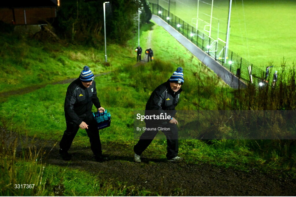 7 January 2026; Cavan operations manager Phelim Reilly, right, and manager Dermot McCabe make their way back up to the clubhouse from the warm-up pitch before  the Bank of Ireland Dr McKenna Cup match between Fermanagh and Cavan at St Patrick's Park in Tempo, Fermanagh. Photo by Shauna Clinton/Sportsfile