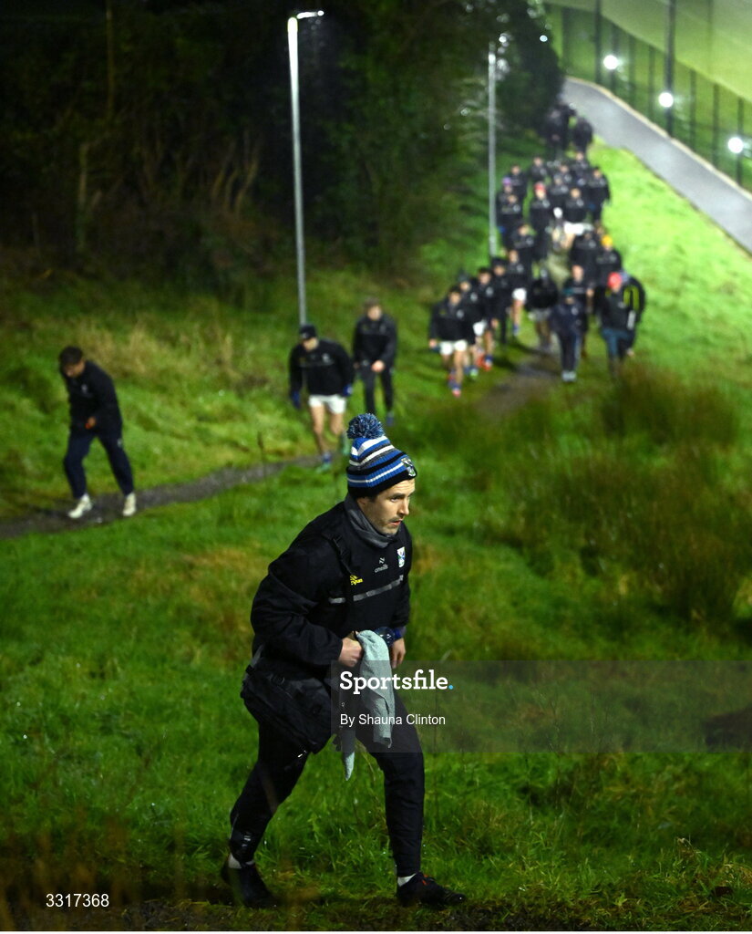 7 January 2026; Cavan players make their way back up to the clubhouse from the warm-up pitch before  the Bank of Ireland Dr McKenna Cup match between Fermanagh and Cavan at St Patrick's Park in Tempo, Fermanagh. Photo by Shauna Clinton/Sportsfile
