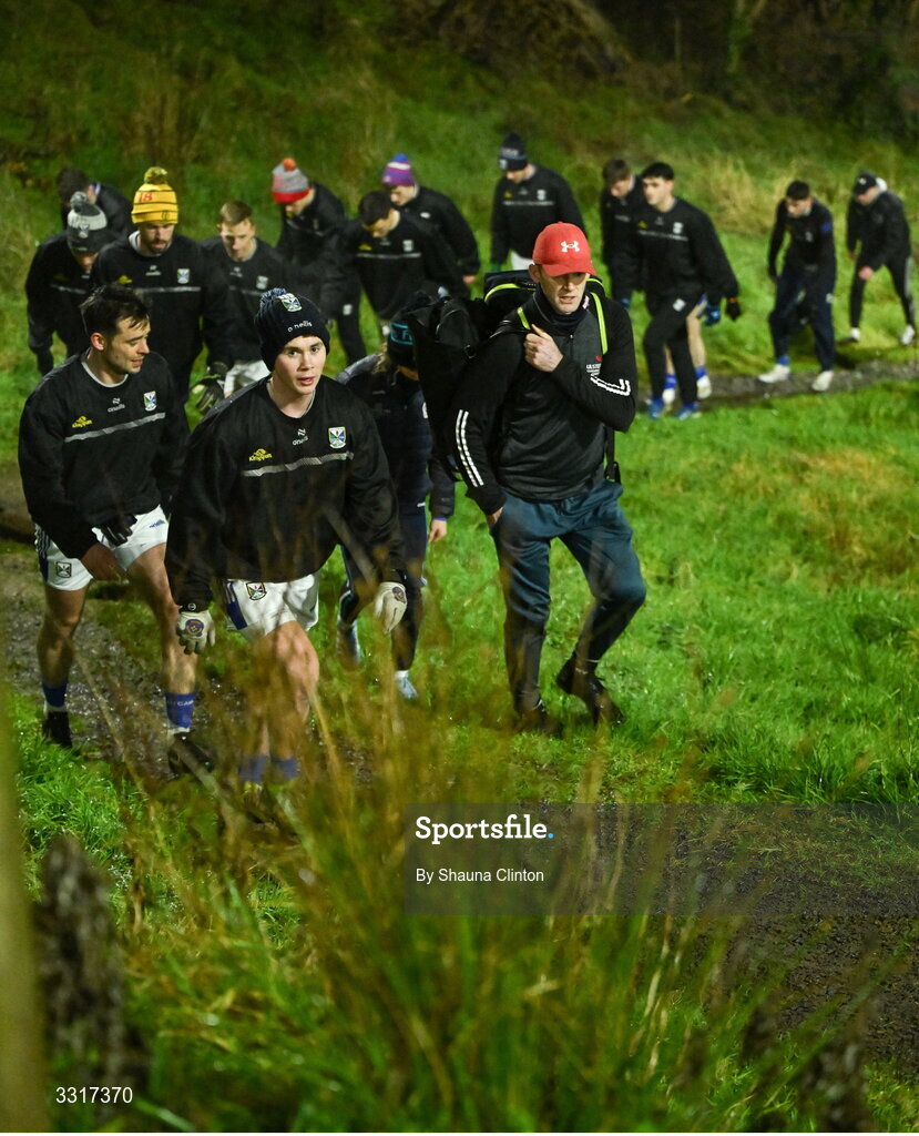 7 January 2026; Cavan players make their way back up to the clubhouse from the warm-up pitch before  the Bank of Ireland Dr McKenna Cup match between Fermanagh and Cavan at St Patrick's Park in Tempo, Fermanagh. Photo by Shauna Clinton/Sportsfile