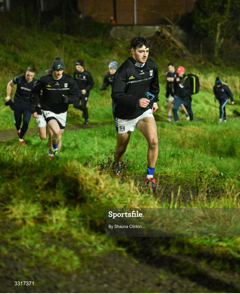 7 January 2026; Cavan players make their way back up to the clubhouse from the warm-up pitch before  the Bank of Ireland Dr McKenna Cup match between Fermanagh and Cavan at St Patrick's Park in Tempo, Fermanagh. Photo by Shauna Clinton/Sportsfile