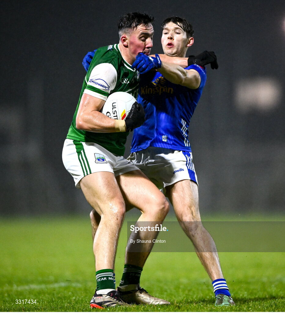 7 January 2026; Stephen McGullion of Fermanagh is tackled by Paddy Meade of Cavan during the Bank of Ireland Dr McKenna Cup match between Fermanagh and Cavan at St Patrick's Park in Tempo, Fermanagh. Photo by Shauna Clinton/Sportsfile