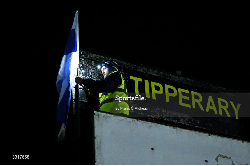 6 January 2026; Groundsman Joe Carmody puts up the Cappawhite GAA club flag before the McGrath Cup match between Tipperary and Cork at Cappawhite GAA Club in Tipperary. Photo by Piaras Ó Mídheach/Sportsfile