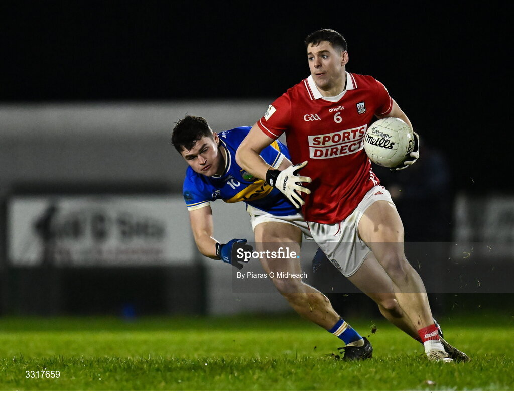 6 January 2026; Rory Maguire of Cork in action against Cathal Deeley of Tipperary during the McGrath Cup match between Tipperary and Cork at Cappawhite GAA Club in Tipperary. Photo by Piaras Ó Mídheach/Sportsfile