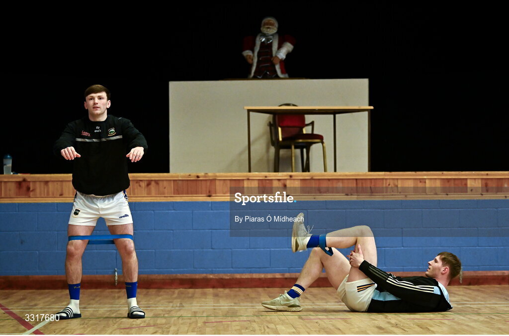 6 January 2026; Tipperary players Emmet Moloney, left, and Paudie Feehan warm-up in the hall before the McGrath Cup match between Tipperary and Cork at Cappawhite GAA Club in Tipperary. Photo by Piaras Ó Mídheach/Sportsfile