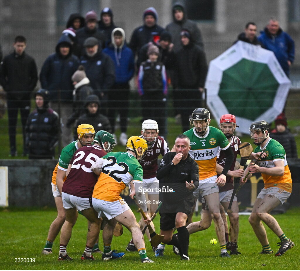 11 January 2026; Referee James McGrath throws the sliotar in to restart the game following a break in play during the Dioralyte Walsh Cup semi-final match between Galway and Offaly at Duggan Park in Ballinasloe, Galway. Photo by Seb Daly/Sportsfile