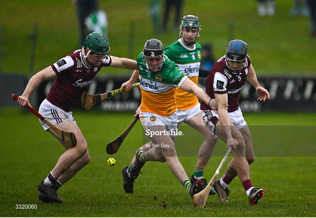11 January 2026; Cathal King of Offaly in action against Galway players Gavin Lee and Dan Loftus during the Dioralyte Walsh Cup semi-final match between Galway and Offaly at Duggan Park in Ballinasloe, Galway. Photo by Seb Daly/Sportsfile