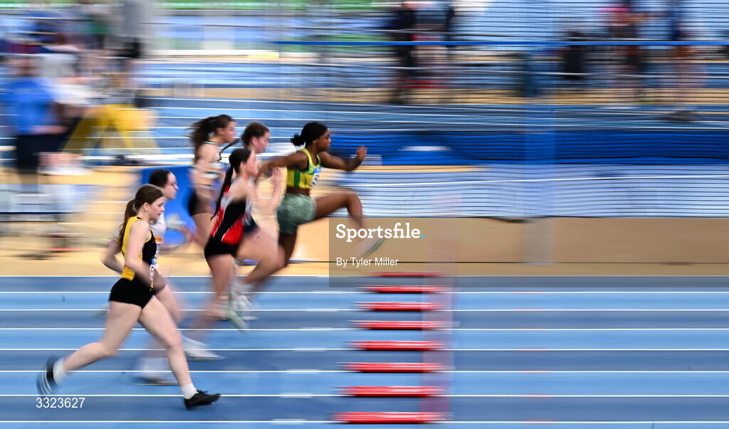 18 January 2026; Hannele Raji of Boyne A.C., Louth, right, leads the field in the girls youth 60m hurdles during day two of the 123.ie National Indoor AAI Games and Combined Events at the National Indoor Arena on the Sport Ireland Campus in Dublin.  Photo by Tyler Miller/Sportsfile