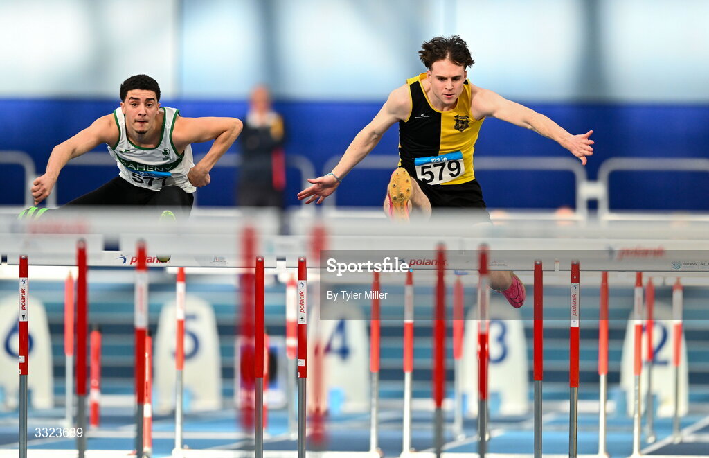 18 January 2026; Noah Gilmore of Kilkenny City Harriers A.C., Kilkenny, right, competes in the senior men's 60m hurdles during day two of the 123.ie National Indoor AAI Games and Combined Events at the National Indoor Arena on the Sport Ireland Campus in Dublin.  Photo by Tyler Miller/Sportsfile