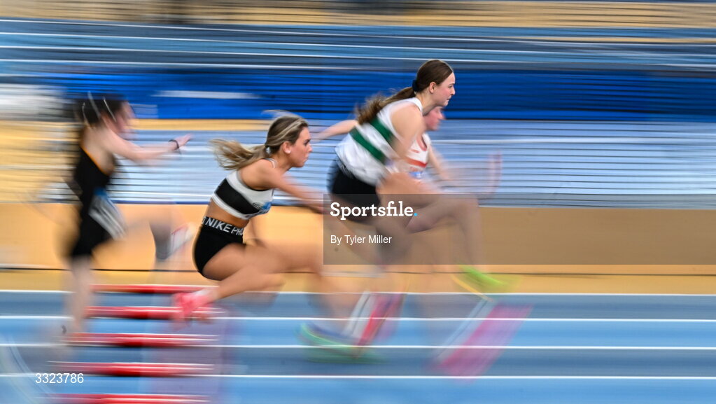 18 January 2026; Cara Ryan of Clonmel A.C., Tipperary, right, leads the field in the girls youth 60m hurdles during day two of the 123.ie National Indoor AAI Games and Combined Events at the National Indoor Arena on the Sport Ireland Campus in Dublin.  Photo by Tyler Miller/Sportsfile