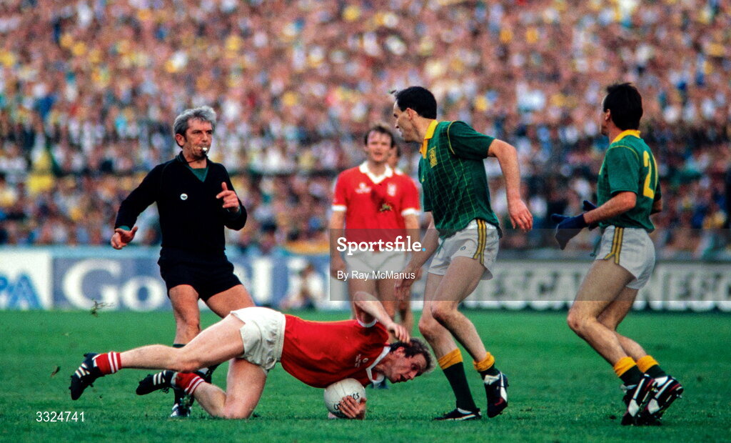 20 September 1987; Larry Tompkins of Cork is tackled by Gerry McEntee of Meath during the All-Ireland Senior Football Championship Final match between Meath and Cork at Croke Park in Dublin. Photo by Ray McManus/Sportsfile