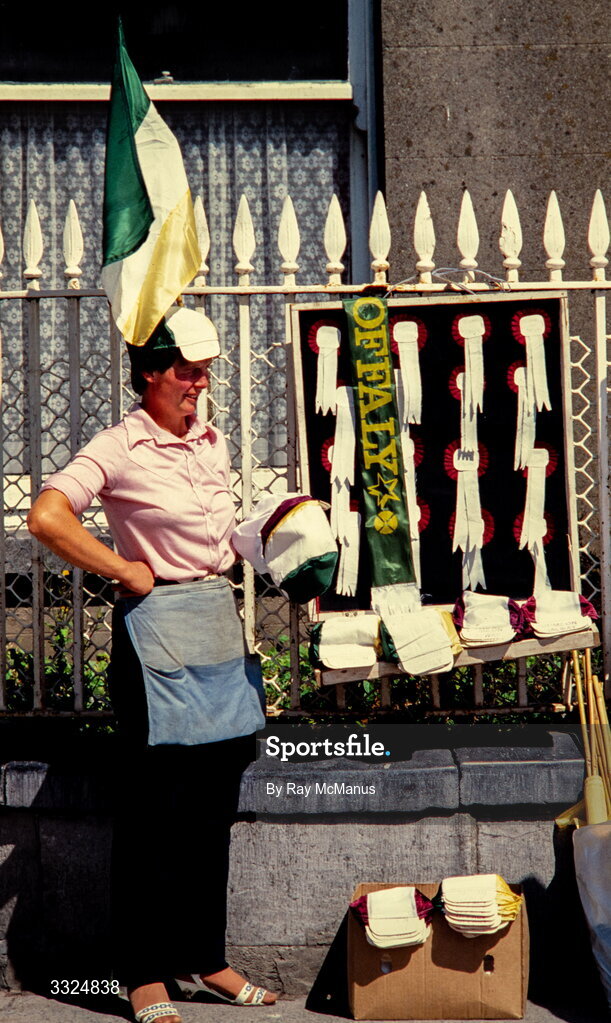 5 August 1984; A vendor sells flags in the streets of Thurles before the All-Ireland Senior Hurling Championship Semi-Final match between Galway and Offaly at Semple Stadium in Thurles, Tipperary. Photo by Ray McManus/Sportsfile