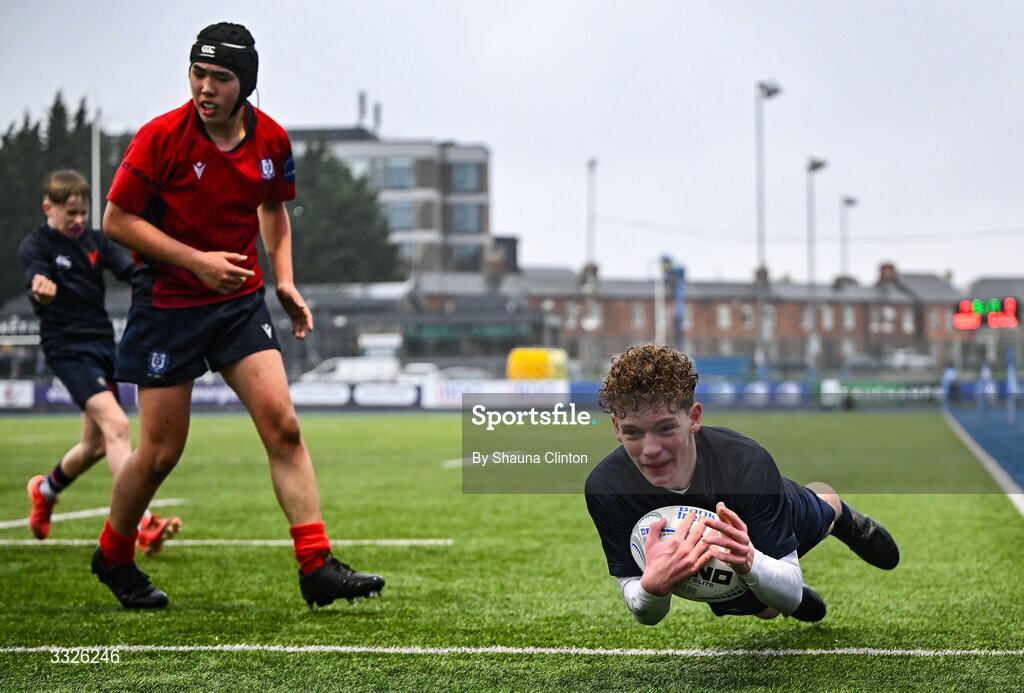 22 January 2026; Harry Greene of Wesly College scores his side's third try during the Bank of Ireland Leinster Rugby Boys Schools Fr Godfrey Cup semi-final match between Wesley College and CUS at Energia Park in Dublin. Photo by Shauna Clinton/Sportsfile