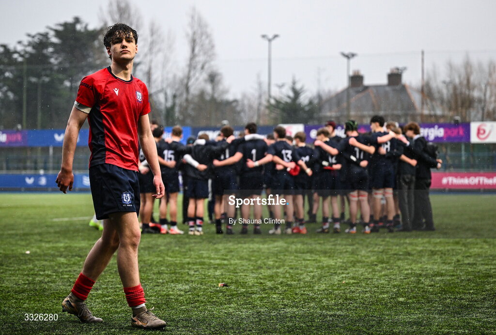 22 January 2026; Oisin Keogh of CUS leaves the pitch dejected after his side's defeat in the Bank of Ireland Leinster Rugby Boys Schools Fr Godfrey Cup semi-final match between Wesley College and CUS at Energia Park in Dublin. Photo by Shauna Clinton/Sportsfile