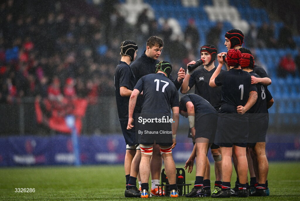 22 January 2026; Wesley College coach and Leinster Rugby player Mahon Ronan, centre, speaks to his players during the Bank of Ireland Leinster Rugby Boys Schools Fr Godfrey Cup semi-final match between Wesley College and CUS at Energia Park in Dublin. Photo by Shauna Clinton/Sportsfile