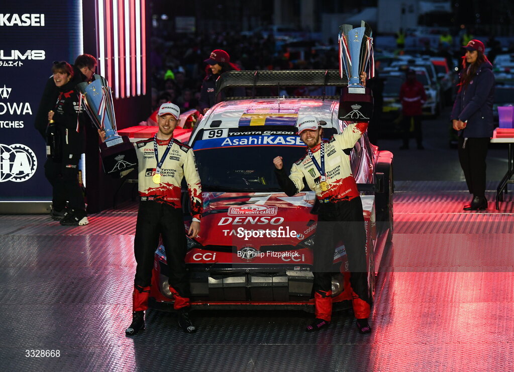 25 January 2026; Toyota GR Yaris Rally1 drivers Elliott Edmondson, left, and Oliver Solberg celebrates with the trophies after winning the FIA World Rally Championship in Monte Carlo, France. Photo by Philip Fitzpatrick/Sportsfile