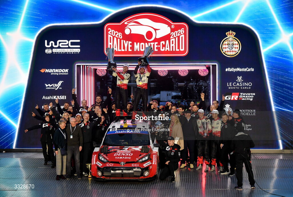 25 January 2026; Toyota GR Yaris Rally1 drivers Elliott Edmondson, left, and Oliver Solberg celebrates with the their team and staff after winning the FIA World Rally Championship in Monte Carlo, France. Photo by Philip Fitzpatrick/Sportsfile