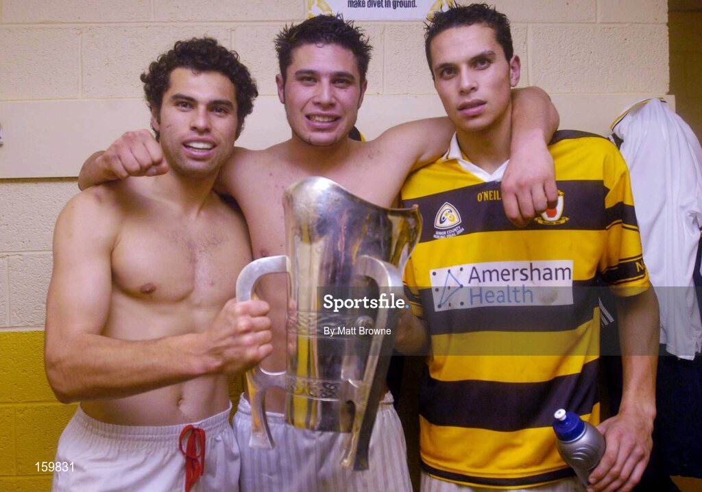 31 October 2004; Sean Og O hAilpin, left, Setanta O hAilpin and Aisake O hAilpin, Na Pairsaigh, pictured with the cup after the win against Cloyne. Cork County Senior  Hurling Final, Na Piarsaigh v Cloyne, Pairc Ui Chaoimh, Cork. Picture credit; Matt Browne / SPORTSFILE
