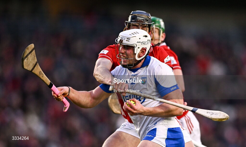 25 January 2026; Reuben Halloran of Waterford is tackled by Robert Downey of Cork during the Allianz Hurling League Division 1A match between Cork and Waterford at SuperValu Páirc Uí Chaoimh in Cork. Photo by Ben McShane/Sportsfile
