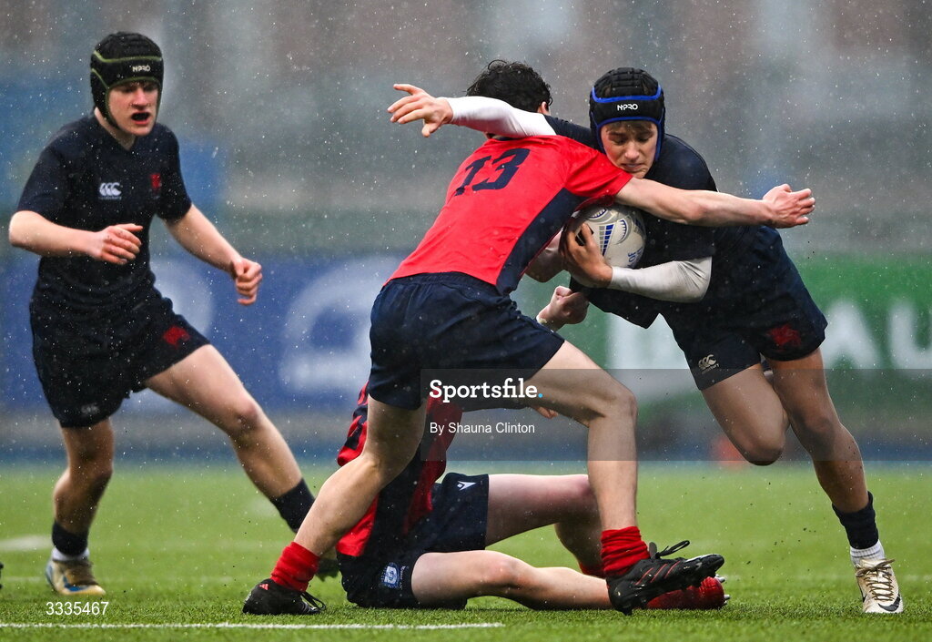 22 January 2026; Luke Hamilton of Wesley College in action against Leonard Deering of CUS during the Bank of Ireland Leinster Rugby Boys Schools Fr Godfrey Cup semi-final match between Wesley College and CUS at Energia Park in Dublin. Photo by Shauna Clinton/Sportsfile