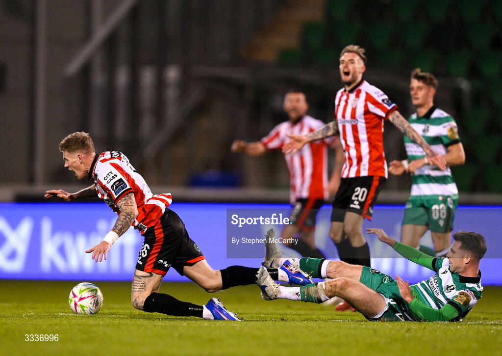 31 January 2026; James McClean of Derry City is tackled by Jack Byrne of Shamrock Rovers during the 2026 Men's President's Cup final match between Shamrock Rovers and Derry City at Tallaght Stadium in Dublin. Photo by Stephen McCarthy/Sportsfile