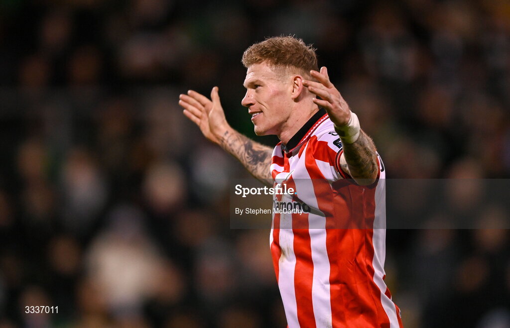 31 January 2026; James McClean of Derry City celebrates in front of the Shamrock Rovers supporters after team-mate Darragh Markey scored their first goal during the 2026 Men's President's Cup final match between Shamrock Rovers and Derry City at Tallaght Stadium in Dublin. Photo by Stephen McCarthy/Sportsfile