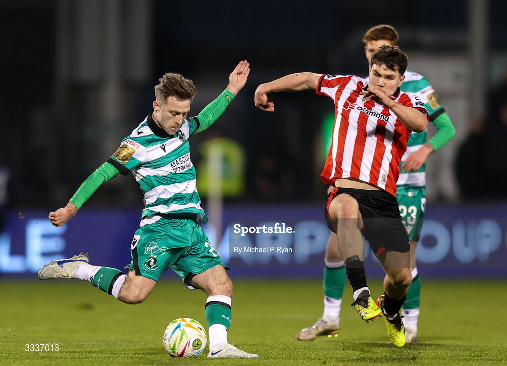 31 January 2026; Jack Byrne of Shamrock Rovers in action against James Clarke of Derry City during the 2026 Men's President's Cup final match between Shamrock Rovers and Derry City at Tallaght Stadium in Dublin. Photo by Michael P Ryan/Sportsfile