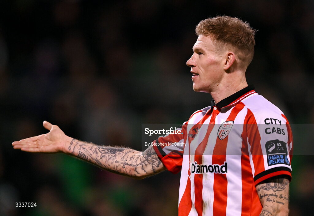 31 January 2026; James McClean of Derry City celebrates in front of the Shamrock Rovers supporters after team-mate Darragh Markey scored their first goal during the 2026 Men's President's Cup final match between Shamrock Rovers and Derry City at Tallaght Stadium in Dublin. Photo by Stephen McCarthy/Sportsfile