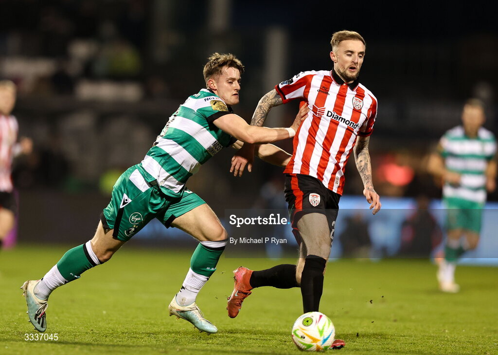31 January 2026; John McGovern of Shamrock Rovers in action against Carl Winchester of Derry City during the 2026 Men's President's Cup final match between Shamrock Rovers and Derry City at Tallaght Stadium in Dublin. Photo by Michael P Ryan/Sportsfile