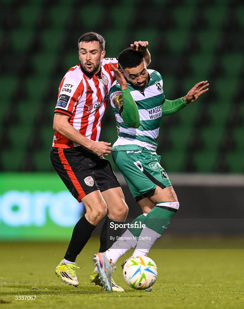 31 January 2026; Michael Duffy of Derry City in action against Jake Mulraney of Shamrock Rovers during the 2026 Men's President's Cup final match between Shamrock Rovers and Derry City at Tallaght Stadium in Dublin. Photo by Stephen McCarthy/Sportsfile