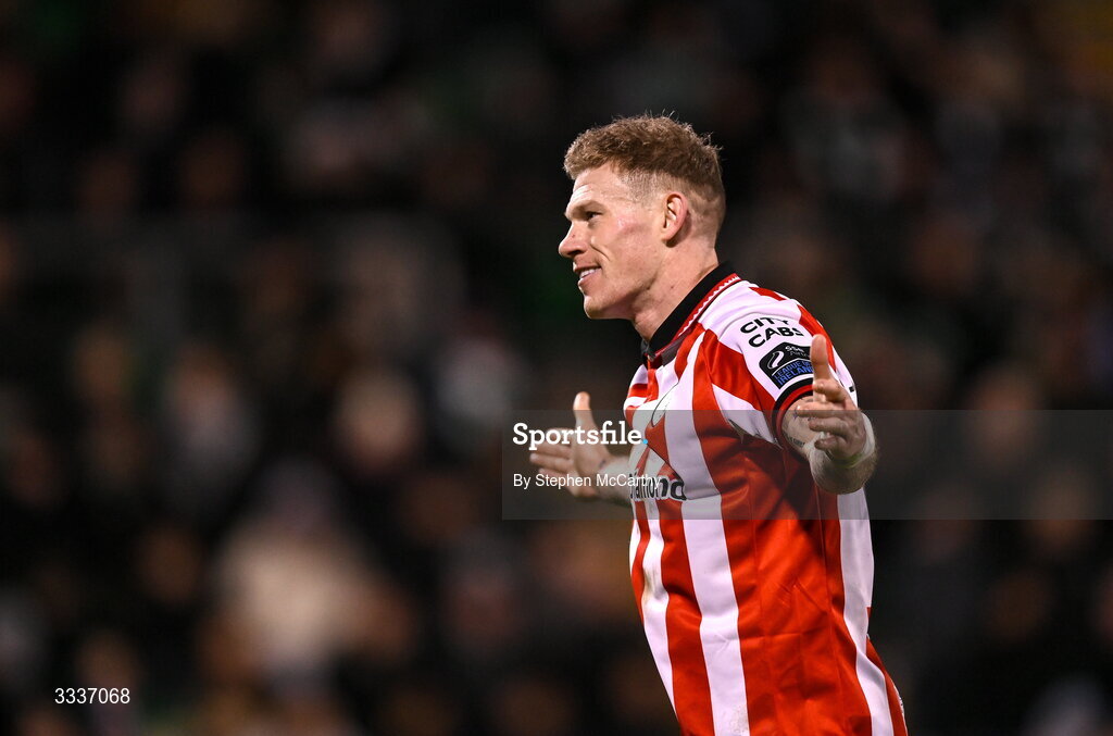 31 January 2026; James McClean of Derry City celebrates infront of the Shamrock Rovers supporters after team-mate Darragh Markey scored their first goal during the 2026 Men's President's Cup final match between Shamrock Rovers and Derry City at Tallaght Stadium in Dublin. Photo by Stephen McCarthy/Sportsfile
