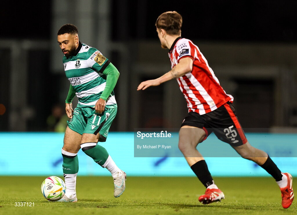 31 January 2026; Jake Mulraney of Shamrock Rovers in action against Alex Bannon of Derry City during the 2026 Men's President's Cup final match between Shamrock Rovers and Derry City at Tallaght Stadium in Dublin. Photo by Michael P Ryan/Sportsfile