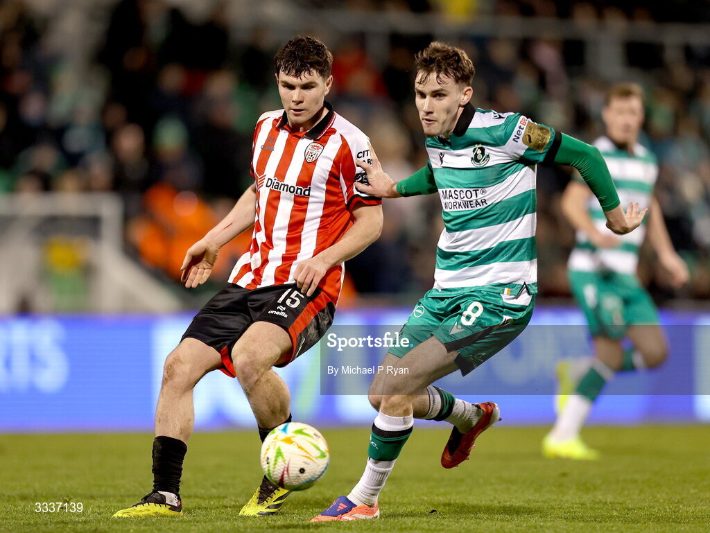 31 January 2026; James Clarke of Derry City in action against Matt Healy of Shamrock Rovers during the 2026 Men's President's Cup final match between Shamrock Rovers and Derry City at Tallaght Stadium in Dublin. Photo by Michael P Ryan/Sportsfile
