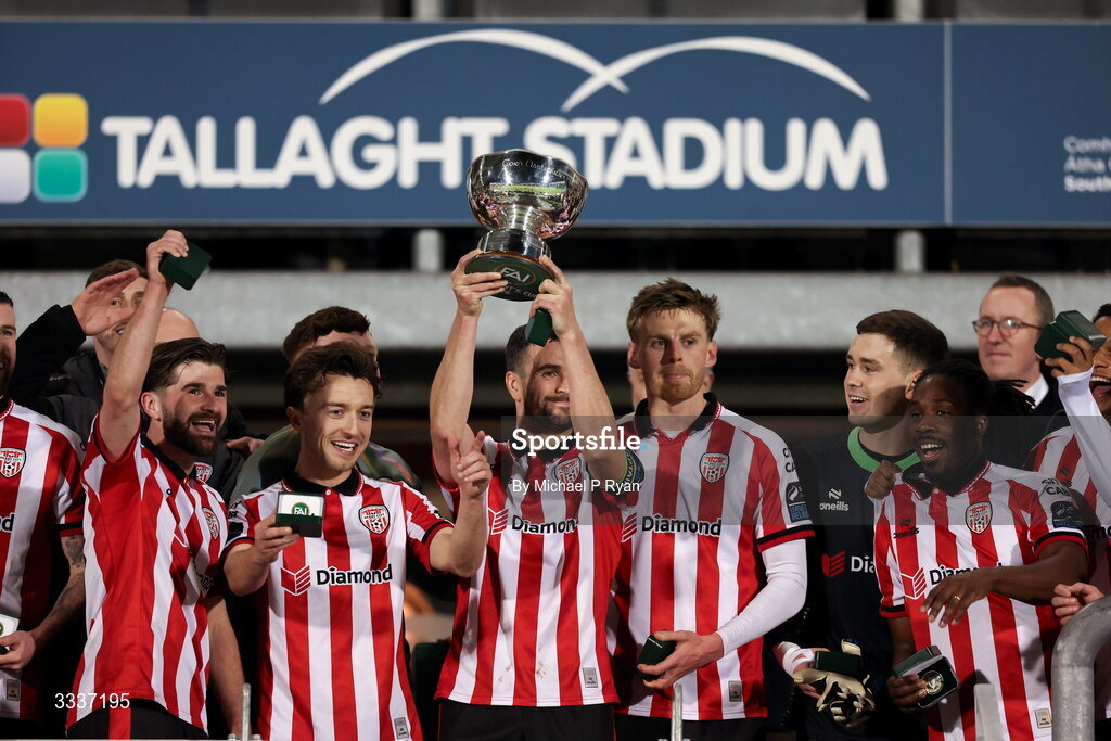 31 January 2026; Derry City captain Michael Duffy lifts the President's Cup after the 2026 Men's President's Cup final match between Shamrock Rovers and Derry City at Tallaght Stadium in Dublin. Photo by Michael P Ryan/Sportsfile