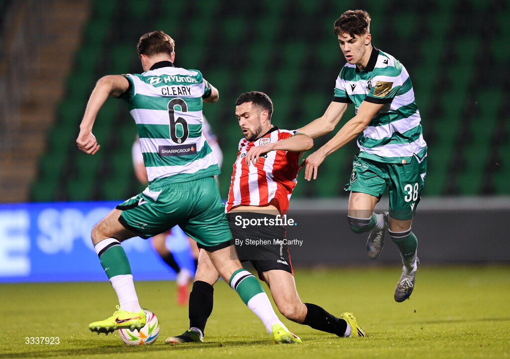31 January 2026; Michael Duffy of Derry City in action against Max Kovalevskis, right, and Daniel Cleary of Shamrock Rovers during the 2026 Men's President's Cup final match between Shamrock Rovers and Derry City at Tallaght Stadium in Dublin. Photo by Stephen McCarthy/Sportsfile