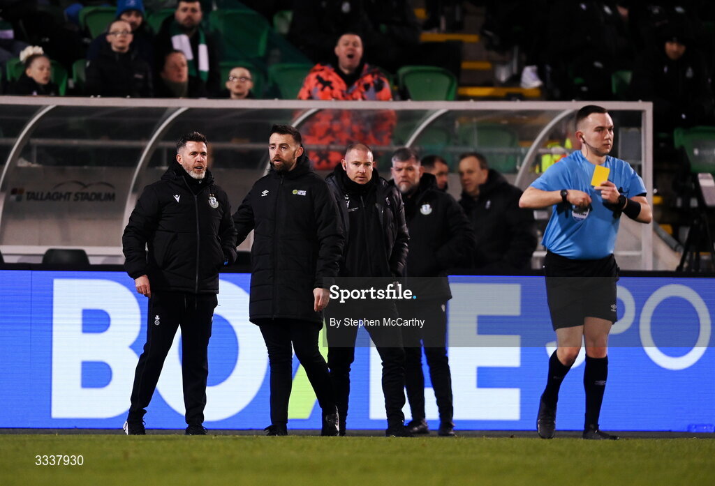 31 January 2026; Shamrock Rovers manager Stephen Bradley, left, looks towards referee Kevin O'Sullivan after he showed a yellow card to the Shamrock Rovers manager during the 2026 Men's President's Cup final match between Shamrock Rovers and Derry City at Tallaght Stadium in Dublin. Photo by Stephen McCarthy/Sportsfile