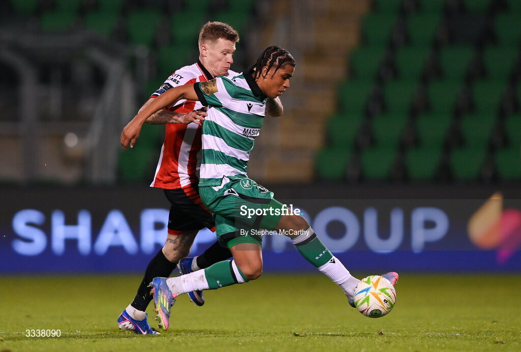 31 January 2026; Victor Ozhianvuna of Shamrock Rovers in action against James McClean of Derry City during the 2026 Men's President's Cup final match between Shamrock Rovers and Derry City at Tallaght Stadium in Dublin. Photo by Stephen McCarthy/Sportsfile
