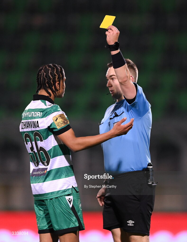 31 January 2026; Victor Ozhianvuna of Shamrock Rovers is shown a yellow card by referee Kevin O'Sullivan during the 2026 Men's President's Cup final match between Shamrock Rovers and Derry City at Tallaght Stadium in Dublin. Photo by Stephen McCarthy/Sportsfile