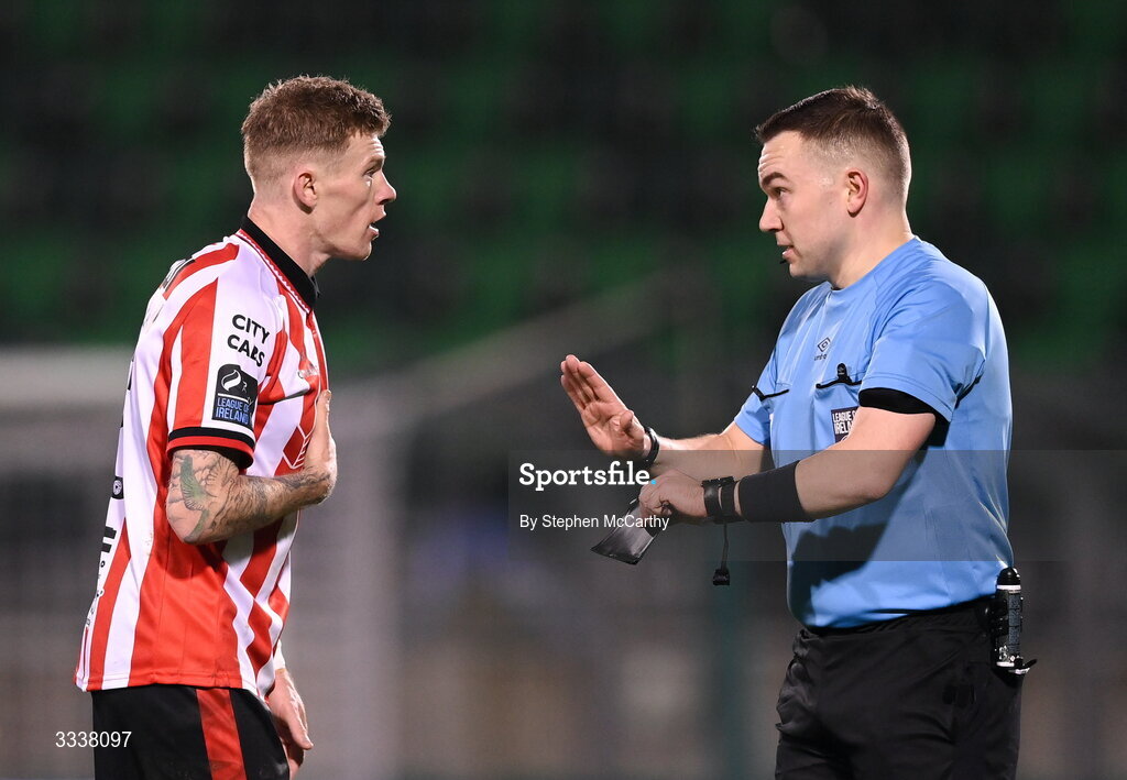 31 January 2026; James McClean of Derry City speaks with referee Kevin O'Sullivan during the 2026 Men's President's Cup final match between Shamrock Rovers and Derry City at Tallaght Stadium in Dublin. Photo by Stephen McCarthy/Sportsfile