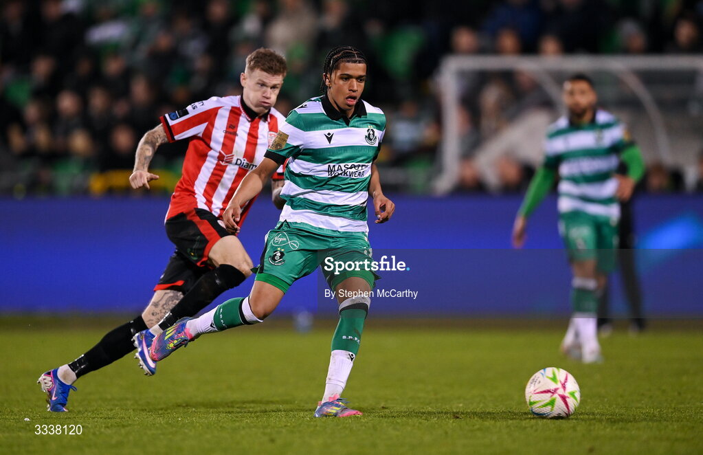 31 January 2026; Victor Ozhianvuna of Shamrock Rovers in action against James McClean of Derry City during the 2026 Men's President's Cup final match between Shamrock Rovers and Derry City at Tallaght Stadium in Dublin. Photo by Stephen McCarthy/Sportsfile
