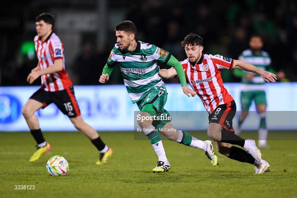 31 January 2026; Dylan Watts of Shamrock Rovers in action against Adam O'Reilly of Derry City during the 2026 Men's President's Cup final match between Shamrock Rovers and Derry City at Tallaght Stadium in Dublin. Photo by Stephen McCarthy/Sportsfile