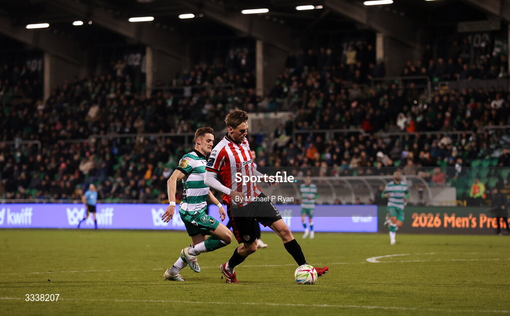 31 January 2026; Rob Slevin of Derry City in action against John McGovern of Shamrock Rovers during the 2026 Men's President's Cup final match between Shamrock Rovers and Derry City at Tallaght Stadium in Dublin. Photo by Michael P Ryan/Sportsfile