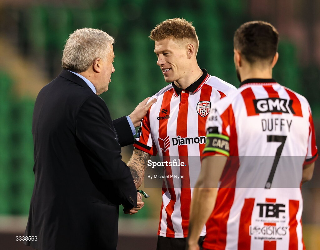 31 January 2026; FAI President Paul Cooke with James McClean of Derry City before the 2026 Men's President's Cup final match between Shamrock Rovers and Derry City at Tallaght Stadium in Dublin. Photo by Michael P Ryan/Sportsfile