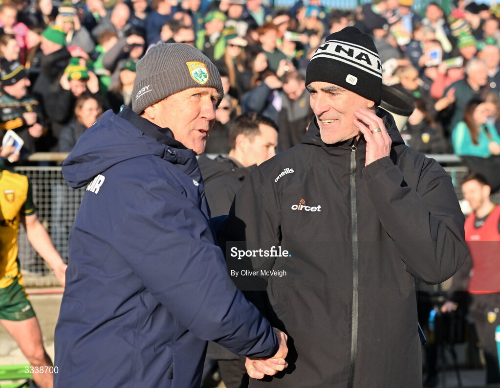 1 February 2026; Kerry manager Jack O'Connor and Donegal manager Jimmy McGuinness greet each other after the Allianz Football League Division 1 match between Donegal and Kerry at Fr Tierney Park in Ballyshannon, Donegal. Photo by Oliver McVeigh/Sportsfile