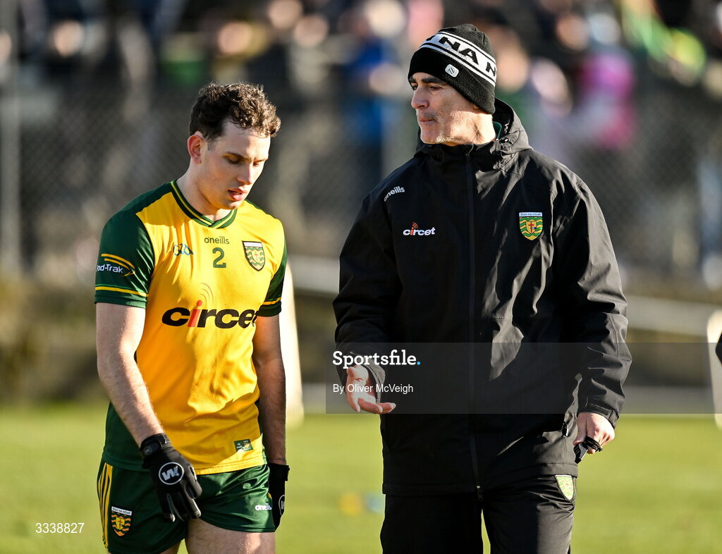 1 February 2026; Donegal manager Jimmy McGuinness talks to Caolan McColgan before the Allianz Football League Division 1 match between Donegal and Kerry at Fr Tierney Park in Ballyshannon, Donegal. Photo by Oliver McVeigh/Sportsfile