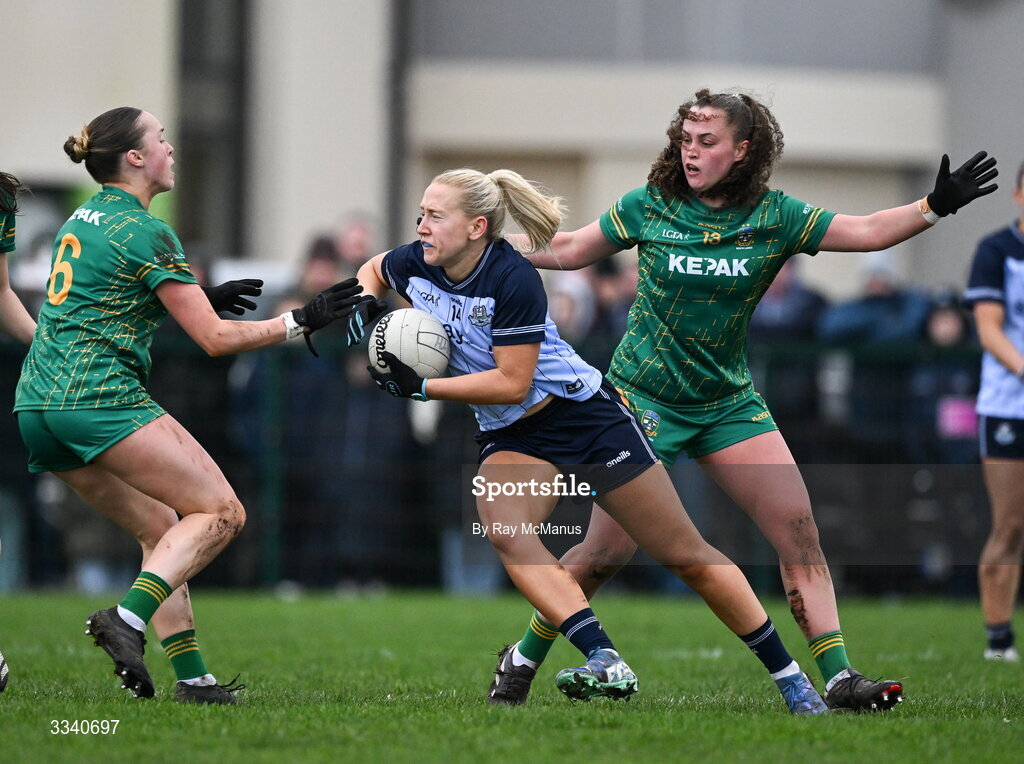 2 February 2026; Jodi Egan of Dublin is tackled by Sarah Wall, 6, and Emma Duggan of Meath during the Lidl Ladies National Football League Division 1 Round 2 match between Meath and Dublin at St Patrick’s GFC in Stamullen, Meath. Photo by Ray McManus/Sportsfile
